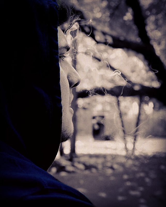 a side profile shot smoking